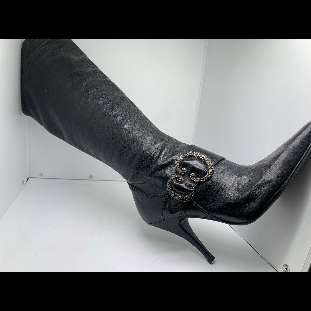 Black knee high heeled boots